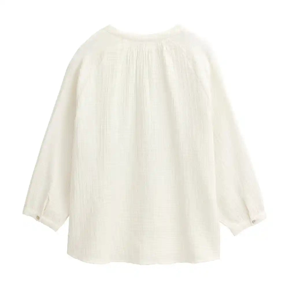 Blusa bianca in mussola di cotone biologico